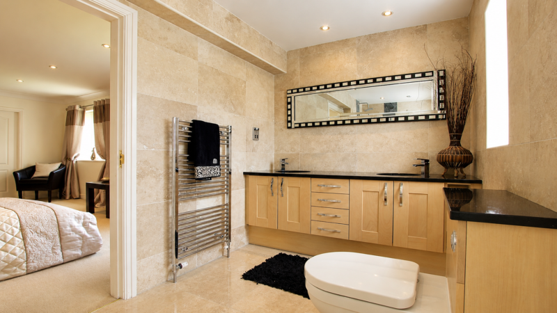 Contemporary en-suite student accommodation room prepared for residential beauty academy learners.